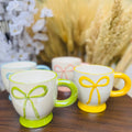 ج بورسلين فيونكة | Bow Design Porcelain Mug